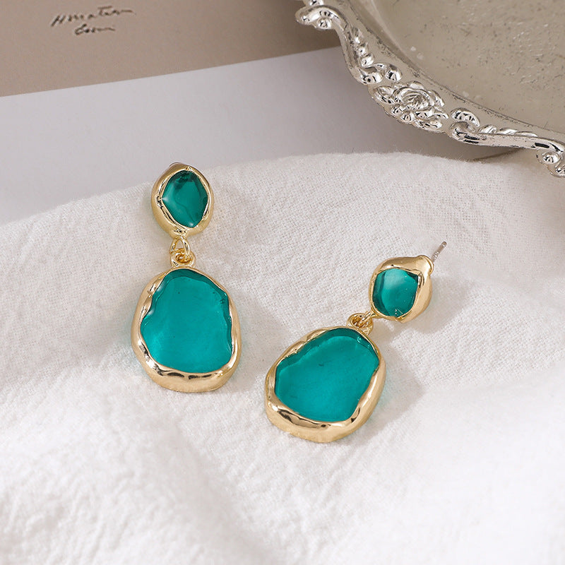 Metal material dripping transparent earrings