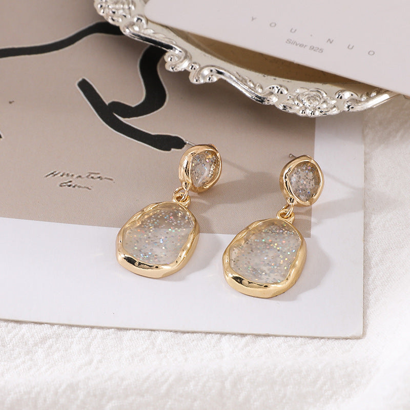 Metal material dripping transparent earrings
